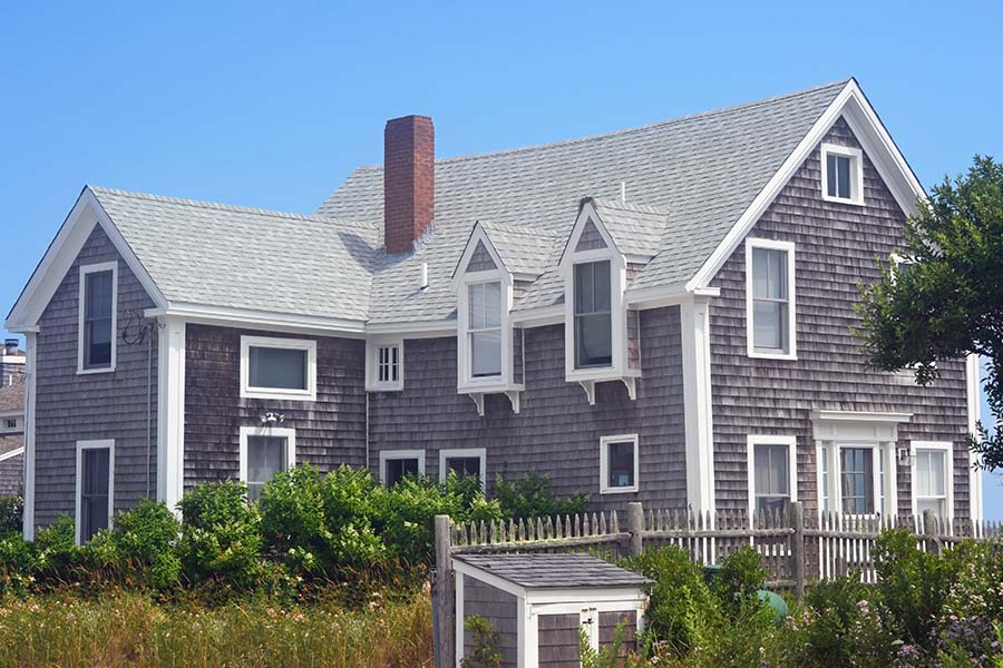 Insurance Quote - View of Three Story New England Cape Cod Home