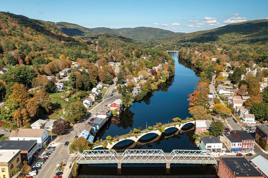 Franklin, MA - Aerial View of the Bridge of Flowers and Surrounding Locations in Massachusetts on a Sunny Morning